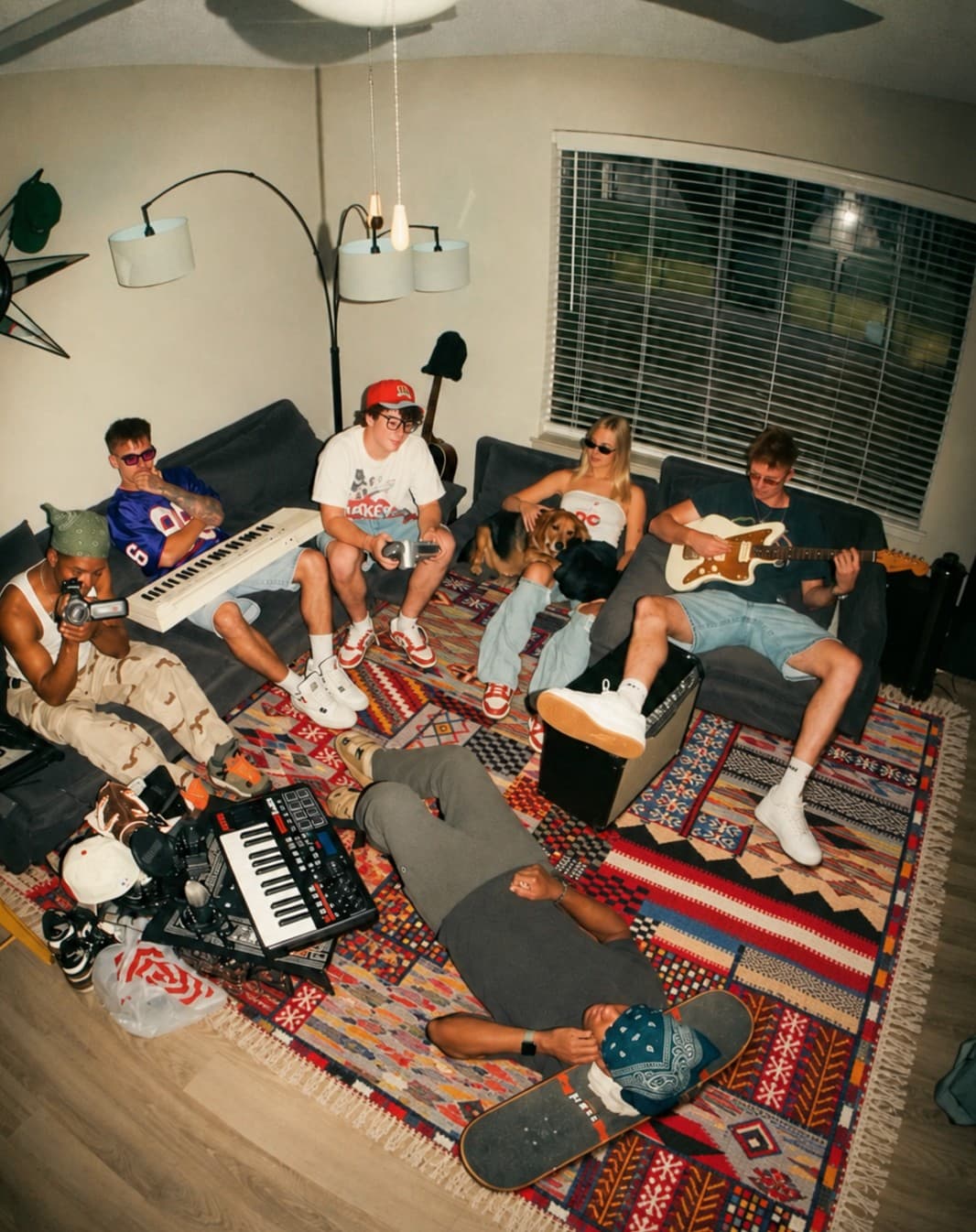 A band rehearsing on an Amazigh carpet